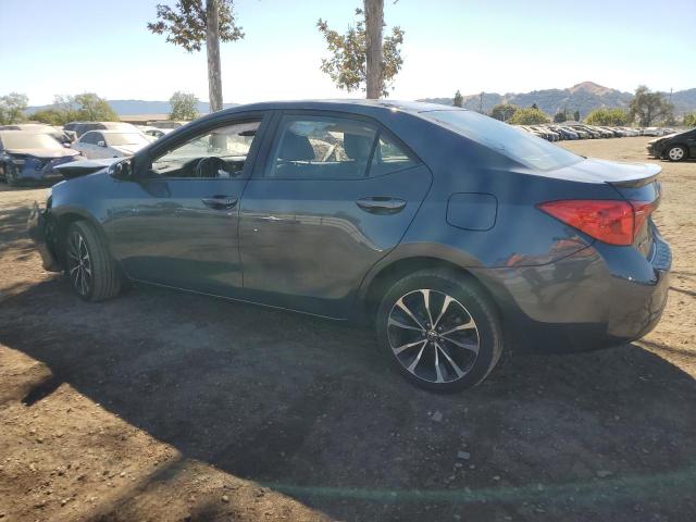 VIN 5YFBURHE7HP574002 2017 Toyota Corolla, L no.2