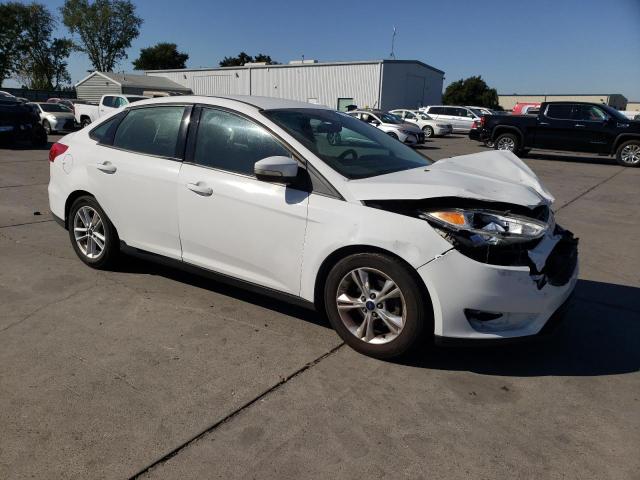 VIN 1FADP3F25FL210954 2015 Ford Focus, SE no.4