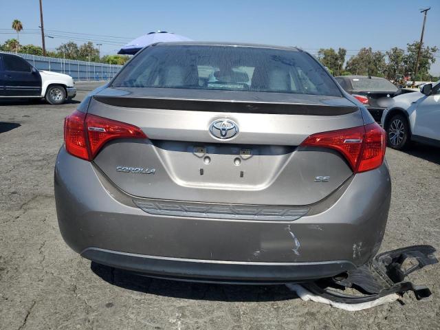 VIN 5YFBURHE3JP786286 2018 Toyota Corolla, L no.6