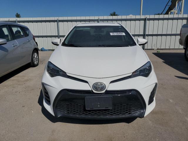 VIN 5YFBURHE3HP620912 2017 Toyota Corolla, L no.5