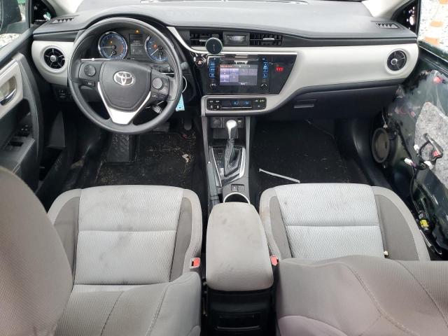 VIN 5YFBURHEXJP764706 2018 Toyota Corolla, L no.8