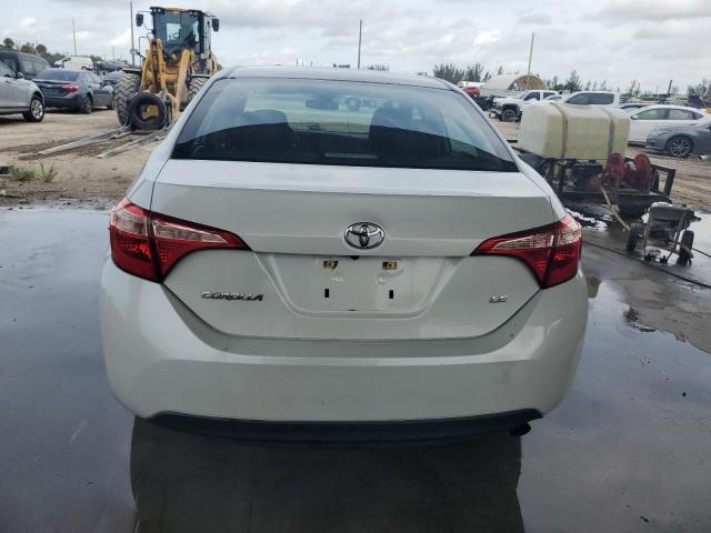 VIN 5YFBURHE4JP854224 2018 Toyota Corolla, L no.6