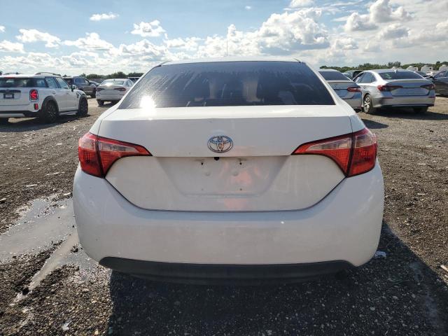 VIN 5YFBURHE6HP730031 2017 Toyota Corolla, L no.6