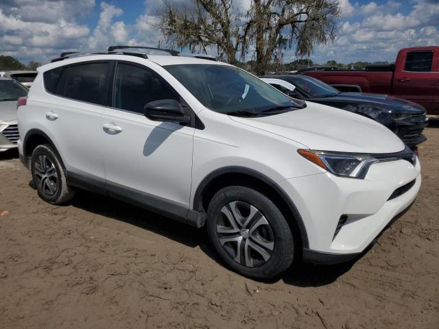 VIN 2T3ZFREV1GW250870 2016 Toyota RAV4, LE no.4