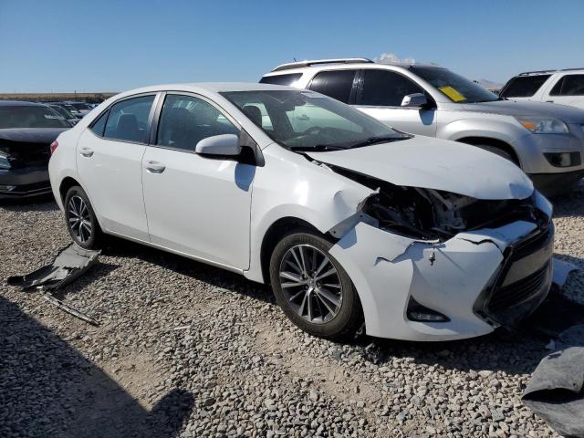 VIN 5YFBURHE7HP659017 2017 Toyota Corolla, L no.4