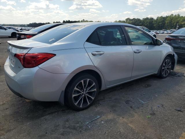 VIN 5YFBURHE7JP758569 2018 Toyota Corolla, L no.3