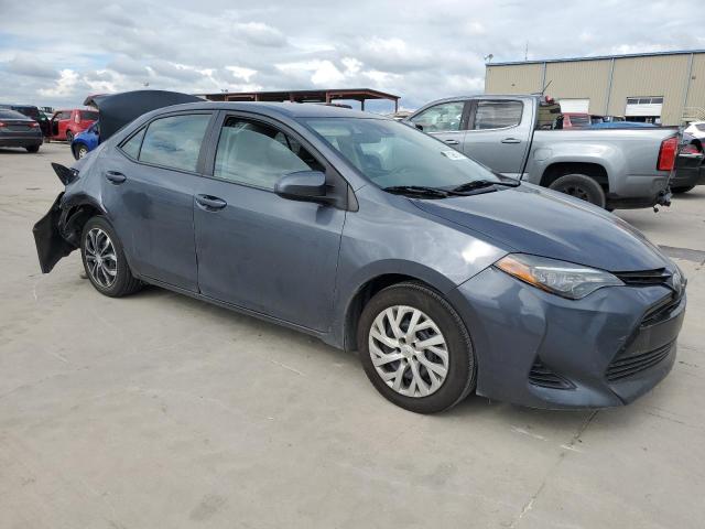 VIN 5YFBURHE8JP749962 2018 Toyota Corolla, L no.4