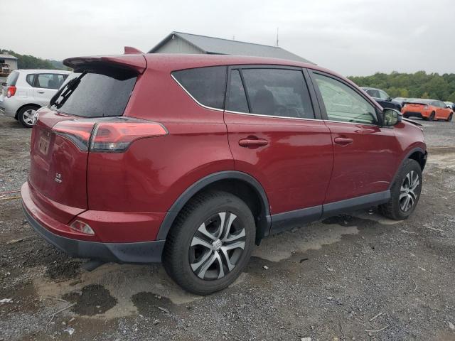 VIN JTMBFREV2JD227717 2018 Toyota RAV4, LE no.3