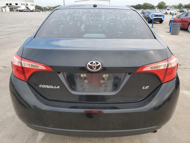 VIN 5YFBURHE6KP864285 2019 Toyota Corolla, L no.6