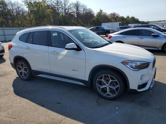 VIN WBXHT3C31J5K20613 2018 BMW X1, Xdrive28I no.4