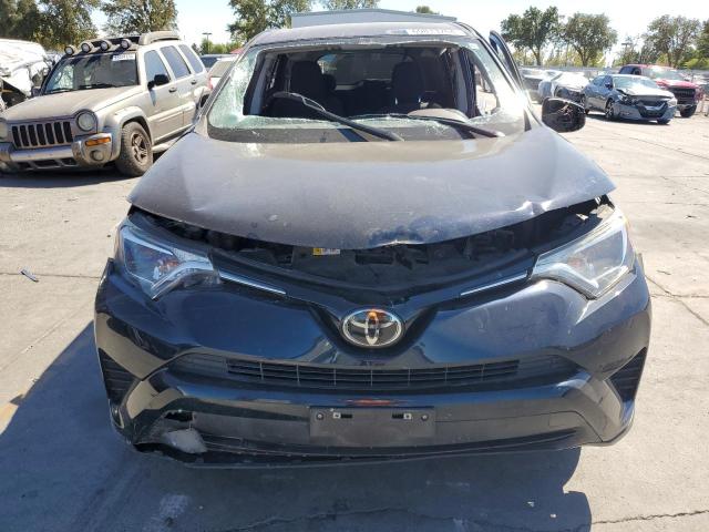 VIN JTMZFREV2JJ728588 2018 Toyota RAV4, LE no.5