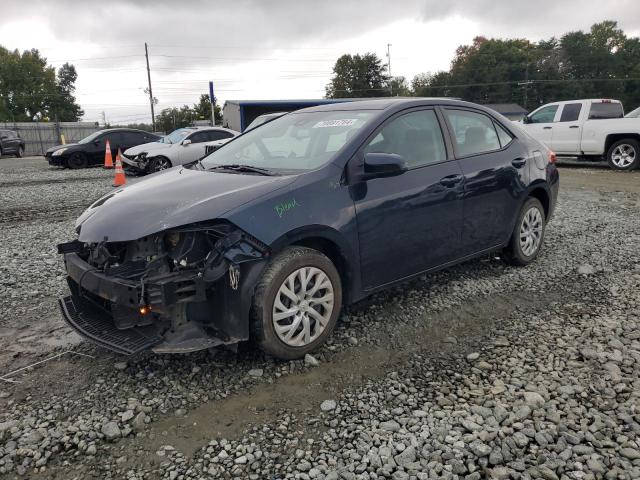 VIN 5YFBURHEXJP764706 2018 Toyota Corolla, L no.1