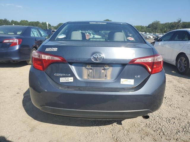 VIN 5YFBURHE8JP777129 2018 Toyota Corolla, L no.6