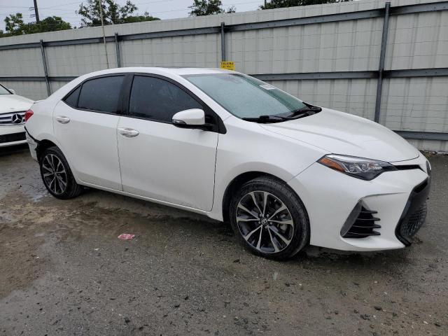 VIN 5YFBURHE2KP873663 2019 Toyota Corolla, L no.4