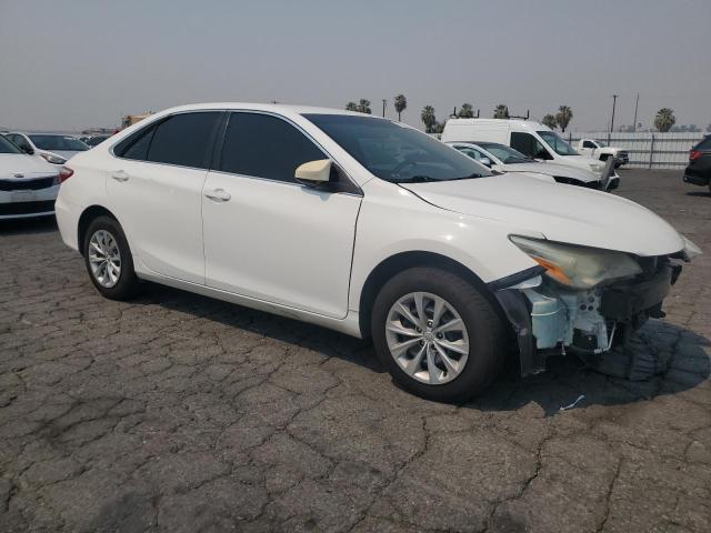 VIN 4T4BF1FK3FR453084 2015 Toyota Camry, LE no.4