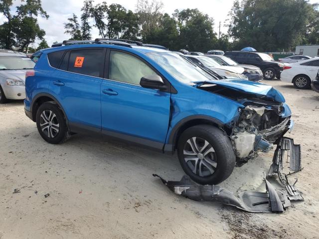 VIN JTMZFREV8JJ730104 2018 Toyota RAV4, LE no.4