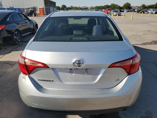 VIN 5YFBURHE2JP815129 2018 Toyota Corolla, L no.6