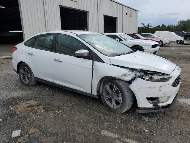 VIN 1FADP3F27JL227277 2018 Ford Focus, SE no.4