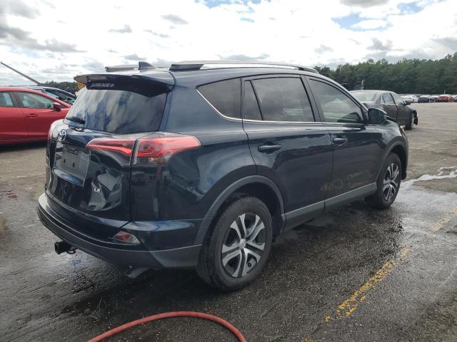 VIN JTMZFREV1HJ117509 2017 Toyota RAV4, LE no.3