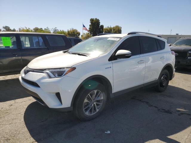 VIN JTMRJREV9JD250666 2018 Toyota RAV4, LE no.1