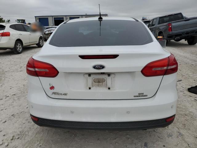 2016 FORD FOCUS SE - 1FADP3F20GL302099