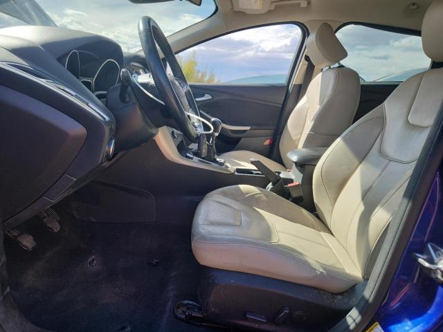 2015 FORD FOCUS TITA 1FADP3N24FL200272