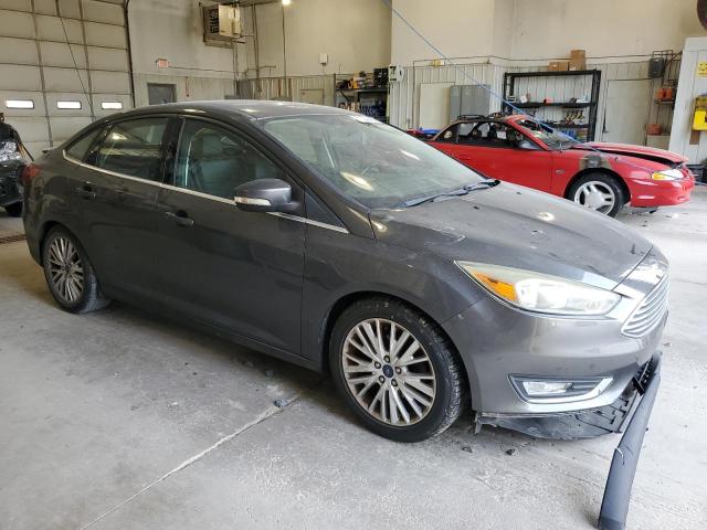 2015 FORD FOCUS TITA 1FADP3J20FL231220