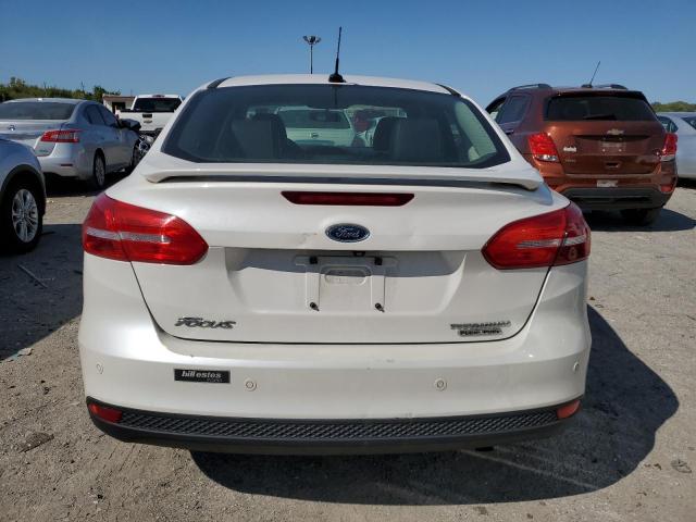 2015 FORD FOCUS TITA 1FADP3J29FL323023