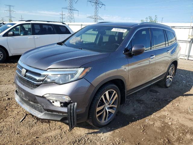 2017 HONDA PILOT TOUR 5FNYF6H97HB059373