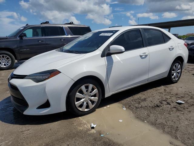 TOYOTA COROLLA L 2017 white sedan 4d gas 5YFBURHE3HP651223 photo #1