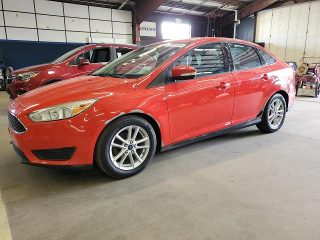 FORD FOCUS SE 2015 red sedan 4d gas 1FADP3F29FL208575 photo #1
