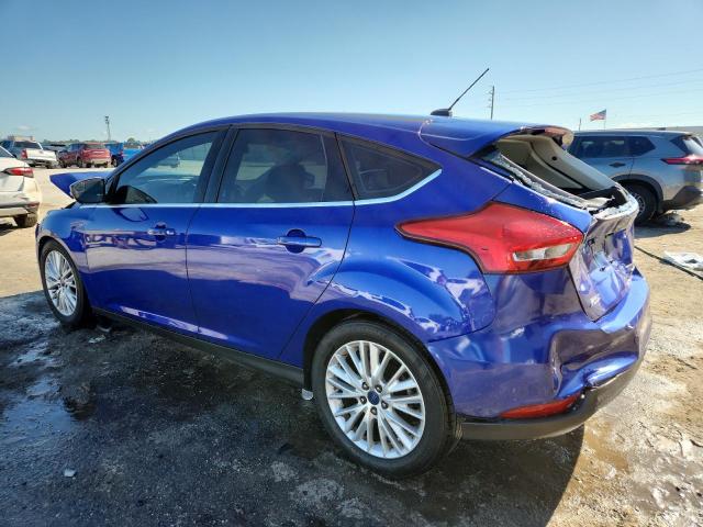2015 FORD FOCUS TITA 1FADP3N24FL338989