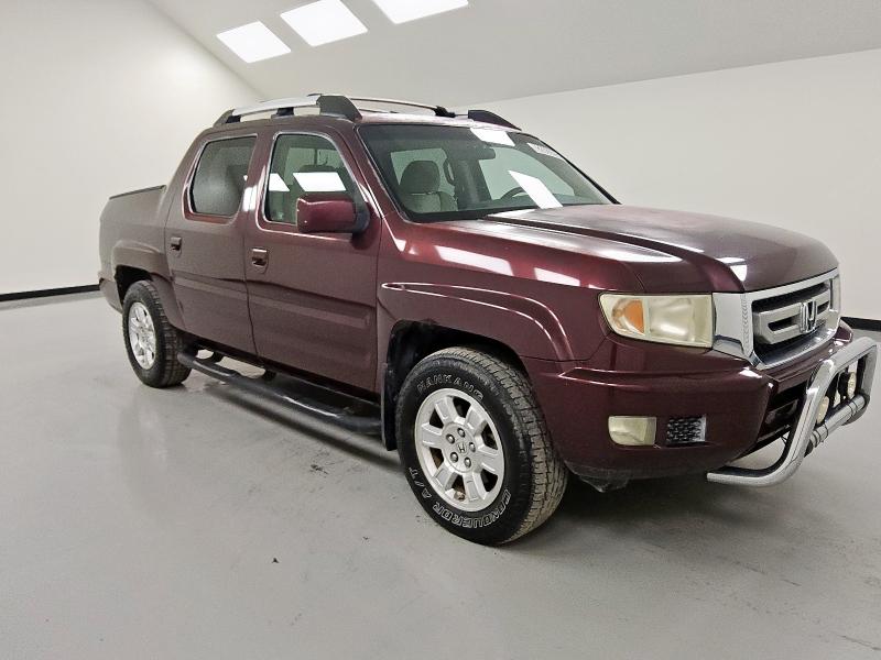 2011 HONDA RIDGELINE - 5FPYK1F47BB006354