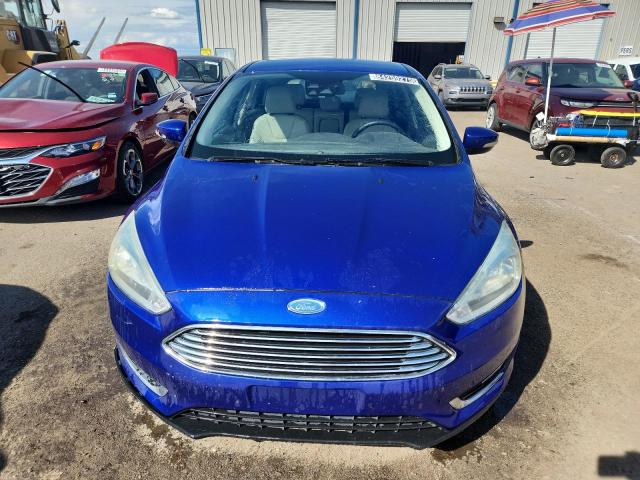 2015 FORD FOCUS TITA 1FADP3N24FL200272