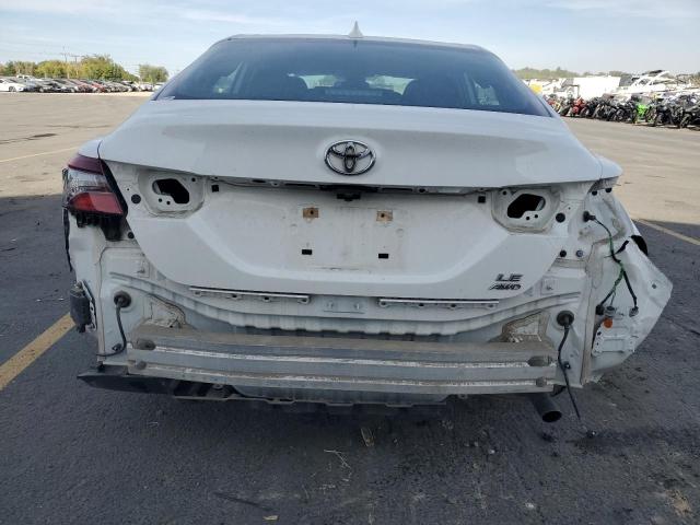 2021 TOYOTA CAMRY LE 4T1C11BK9MU044104