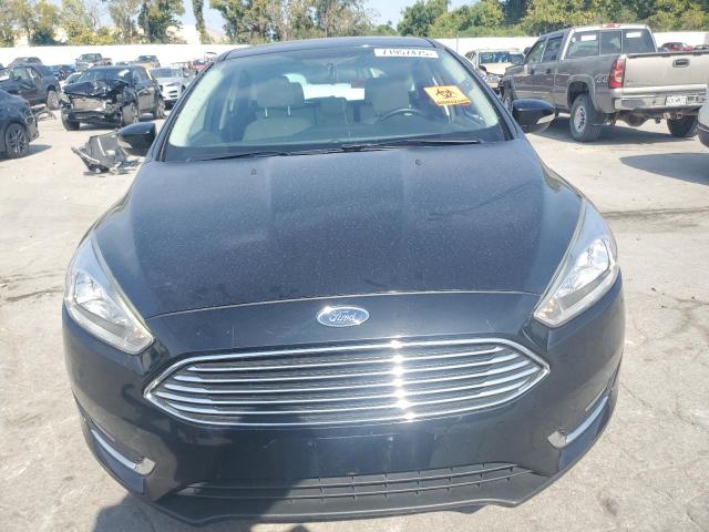 2016 FORD FOCUS TITA 1FADP3N24GL207076