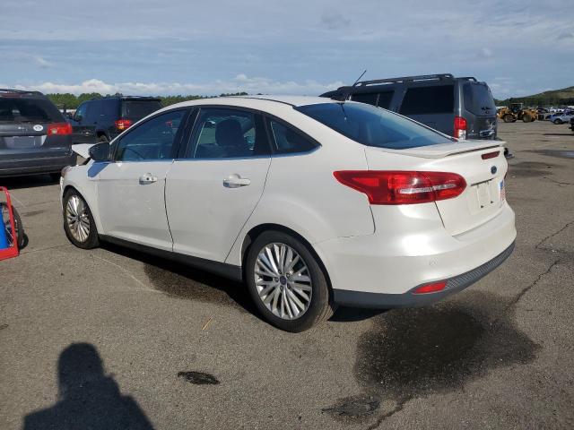 2015 FORD FOCUS TITA 1FADP3J21FL237706