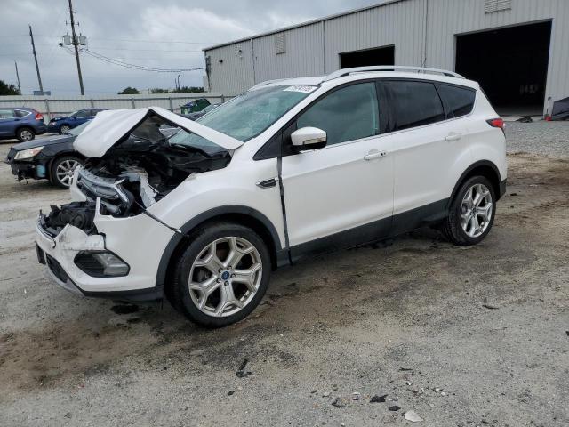 2017 FORD ESCAPE TIT - 1FMCU0J99HUB36609