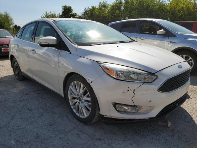 2015 FORD FOCUS TITA 1FADP3J29FL323023