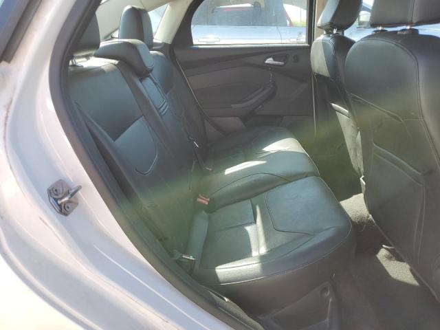 2015 FORD FOCUS TITA 1FADP3J29FL323023