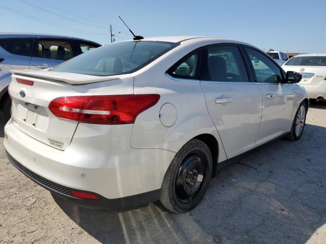 2015 FORD FOCUS TITA 1FADP3J29FL323023