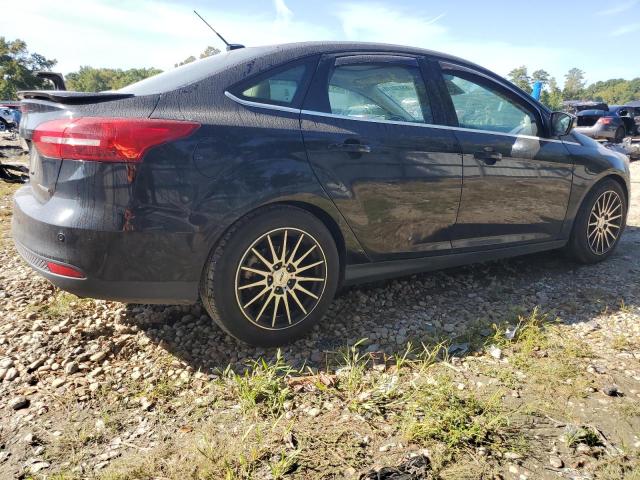 2017 FORD FOCUS TITANIUM 1FADP3J28HL338762