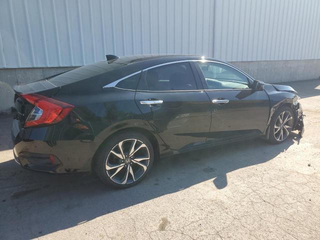 2021 HONDA CIVIC TOUR 2HGFC1F99MH100095