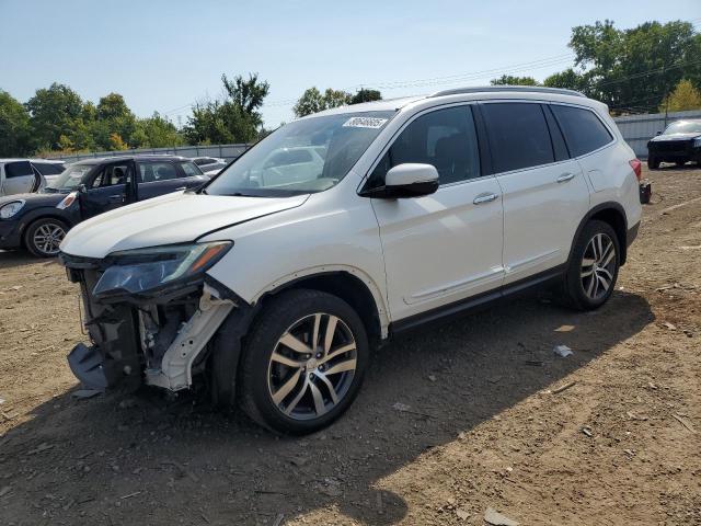2017 HONDA PILOT TOURING 5FNYF6H94HB004704