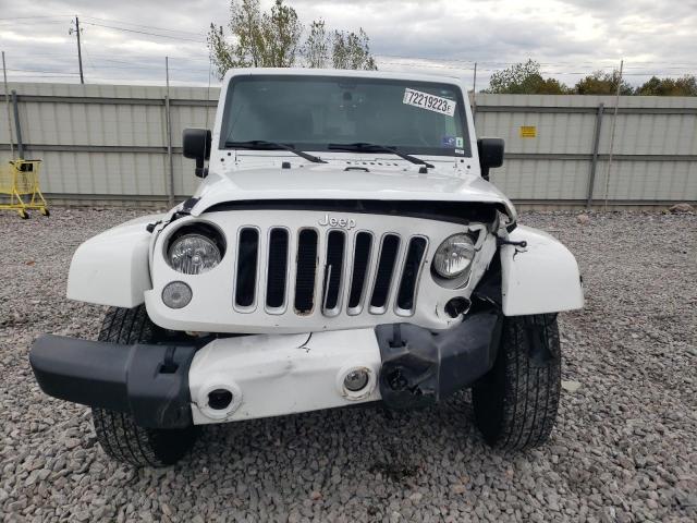 1C4AJWBG9GL220390 Jeep Wrangler Sahara