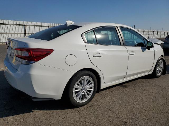 4S3GKAD68J3603890 Subaru Impreza Premium Plus