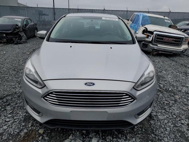 1FADP3N23HL326142 | 2017 FORD FOCUS TITA