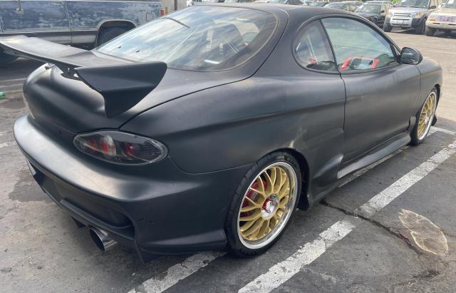 1997 Hyundai Tiburon VIN: KMHJG24M9VU029257 Lot: 74329263