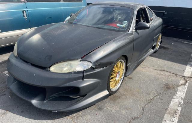 1997 Hyundai Tiburon VIN: KMHJG24M9VU029257 Lot: 74329263