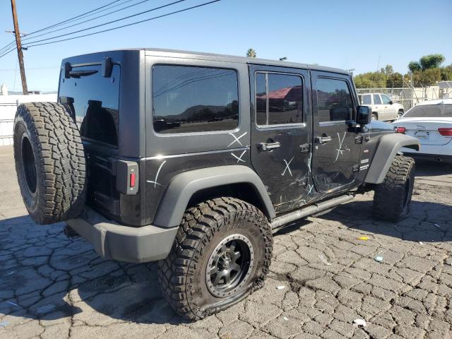 1C4BJWDG0EL126798 Jeep Wrangler Unlimited Sport
